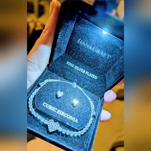 This is a Danecraft fine silver plated cubic heart set With Light Up Box